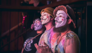 Guy Fawkes masks at a Flamingo Revue burlesque show